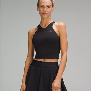 Brand new lululemon tennis tank, tags size 4
